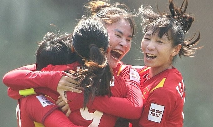 Vietnam players celebrate their win at the Women's World Cup play-off with Chinese Taipei on February 6, 2022. Photo by Asian Football Confederation