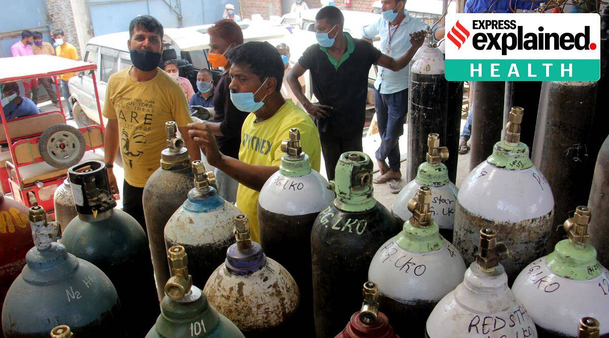 Customers at a store selling medical oxygen cylinders in Lucknow on Friday. (Express Photo: Vishal Srivastav)