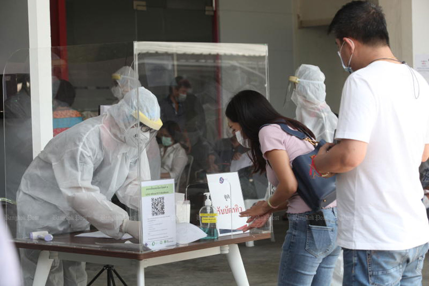 People register for Covid-19 tests at the PCT Co laboratory in Bang Phlat district of Bangkok on Friday. (Photo: Pattarapong​ Chatpattarasill​)