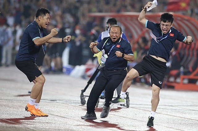 Coach Park Hang-seo (C) celebrates Vietnam's second goal in the opening game of SEA Games 31 against Indonesia, May 6, 2022.