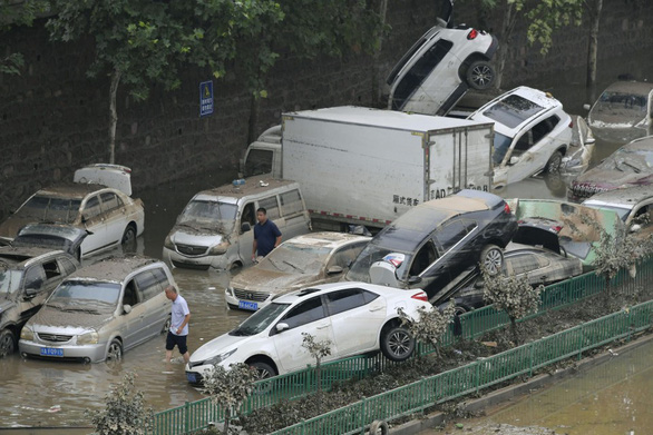 China Flooding: Death Toll Rises to 56, Losses Mount to $10 Billion
