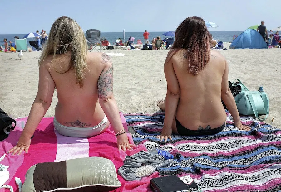 french government defends precious freedom of topless sunbathing