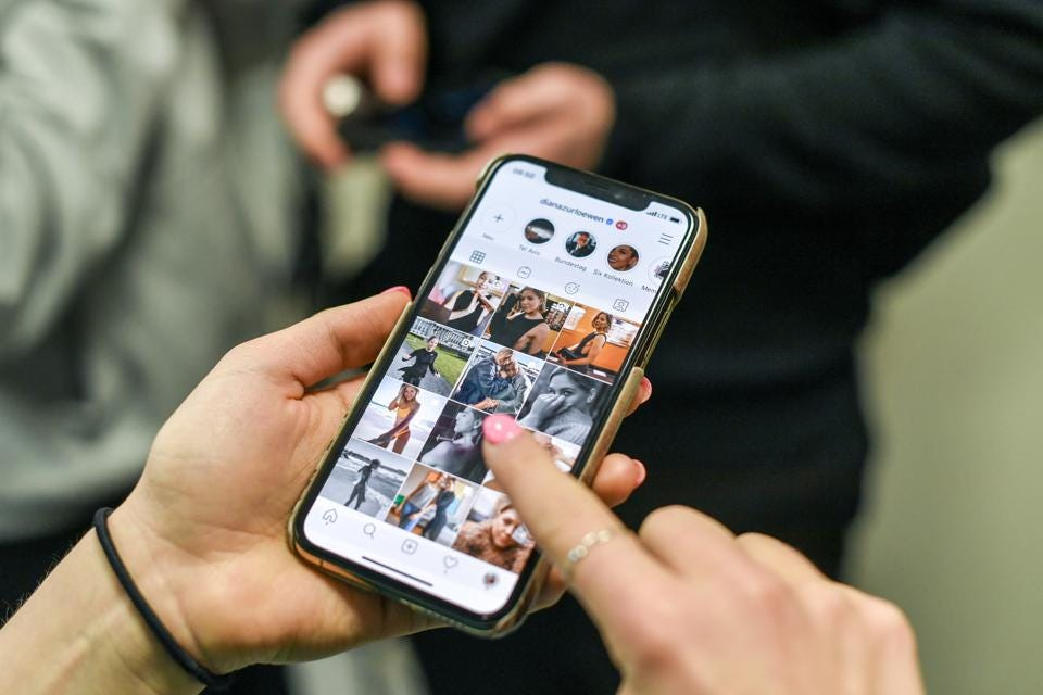iPhone photos are going to be scanned by Apple—something that's polarizing privacy experts. JENS KALAENE/DPA/PICTURE ALLIANCE VIA GETTY IMAGES