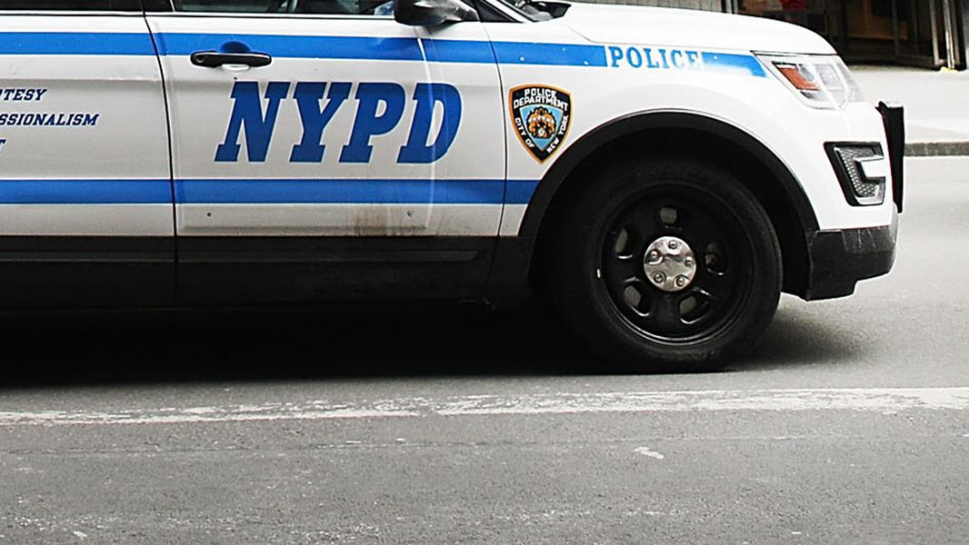 new york city police officer charged of acting as illegal agent of china