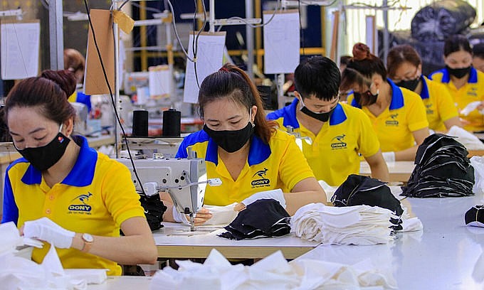 Workers make garment products in a factory in Tan Binh District, Ho Chi Minh City. Photo by VnExpress/Nguyet Nhi