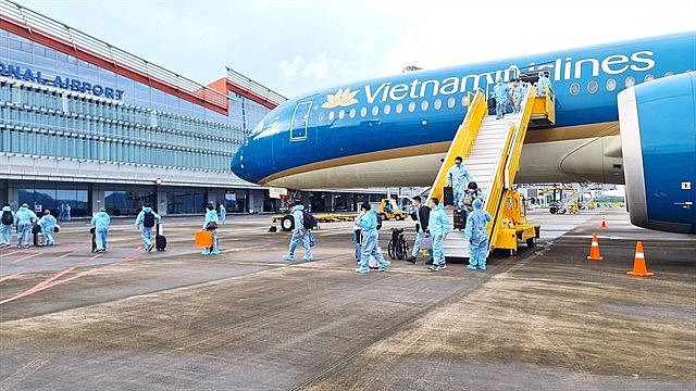 300 Vietnamese nationals repatriated from France flew back to Việt Nam at Vân Đồn International Airport in Quảng Ninh Province under a pilot vaccine passport programme in late September. — VNA