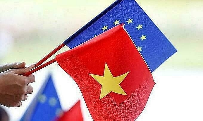 European Union and Vietnamese flags are seen at the signing ceremony of EU-Vietnam Free Trade Agreement at the Government Office in Hanoi, June 30, 2019. Photo by Reuters/Kham.