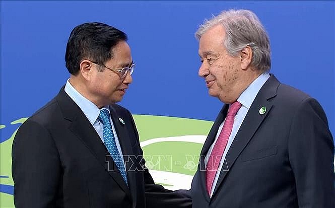 Prime Minister Pham Minh Chinh (left) and the United Nations Secretary-General António Guterres, Glasgow, Scotland, November 1, 2021
