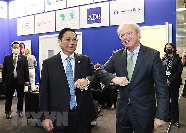 rime Minister Pham Minh Chinh (L) and World Bank (WB) Managing Director of Operations Axel van Trotsenburg (Photo: VNA)