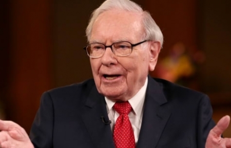 Warren Buffett: 'Bet on America,' buying stocks 