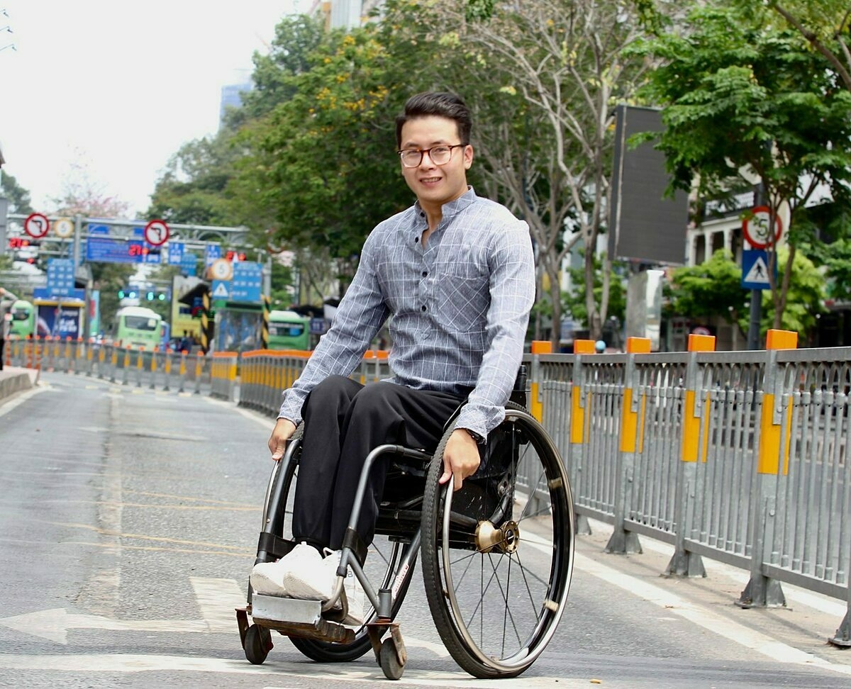 with courage a disable wheelchair bound vietnamese has traveled across vietnam