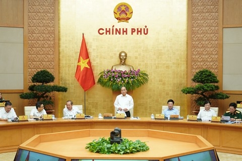 despite covid 19 vietnam government reaffirms determination to overcome challenges