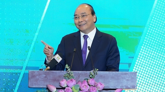 pm urges hanoi to become one of east asia centres by 2045
