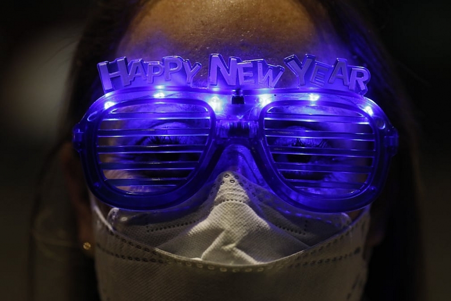 In photos: New Year's Eve around the world with pandemic controlling muting celebrations