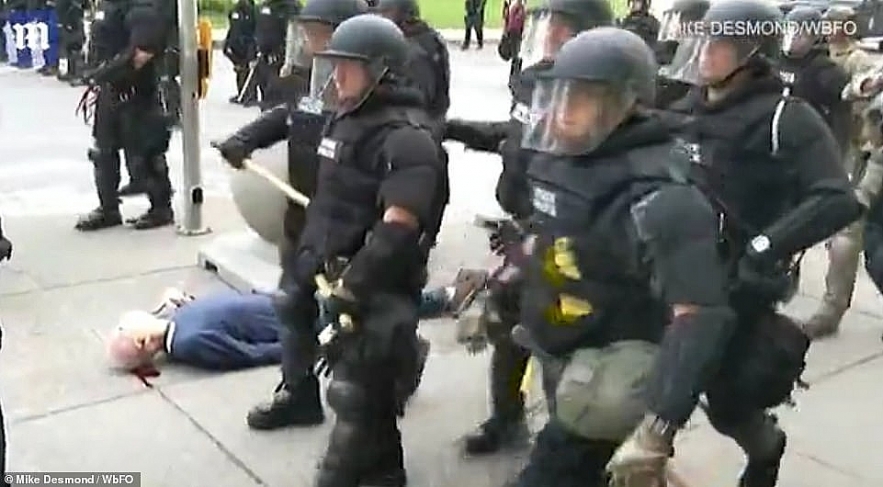 protests and riots in america update two buffalo officers shoving 75 year old protester charged with assault
