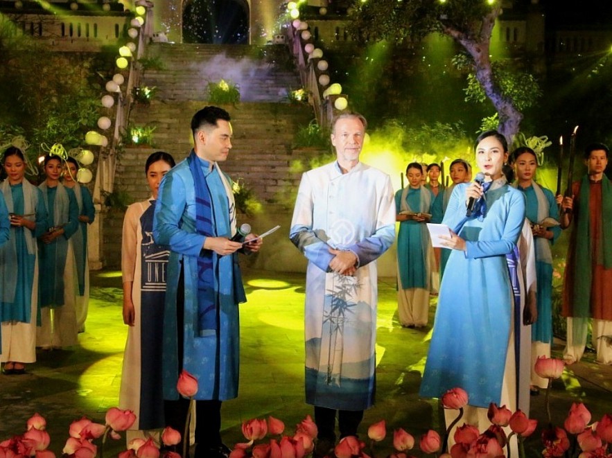 Diplomats And Families Wear Traditional Vietnamese Ao Dai At Exhibition