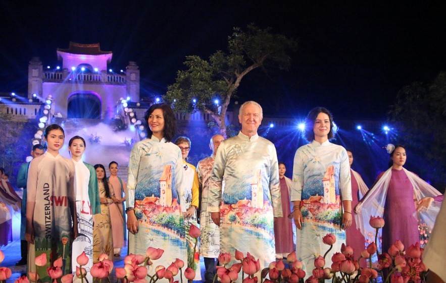 Diplomats And Families Wear Traditional Vietnamese Ao Dai At Exhibition