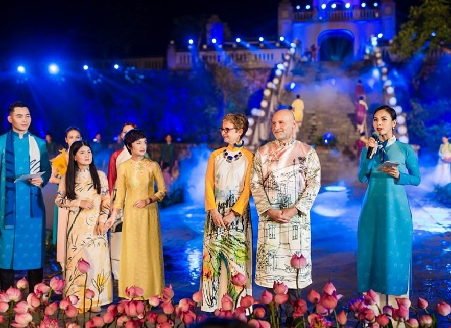 Diplomats And Families Wear Traditional Vietnamese Ao Dai At Exhibition