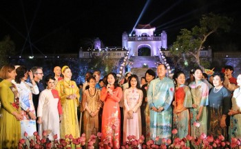 Diplomats And Their Families Wear Traditional Vietnamese Ao Dai At Exhibition