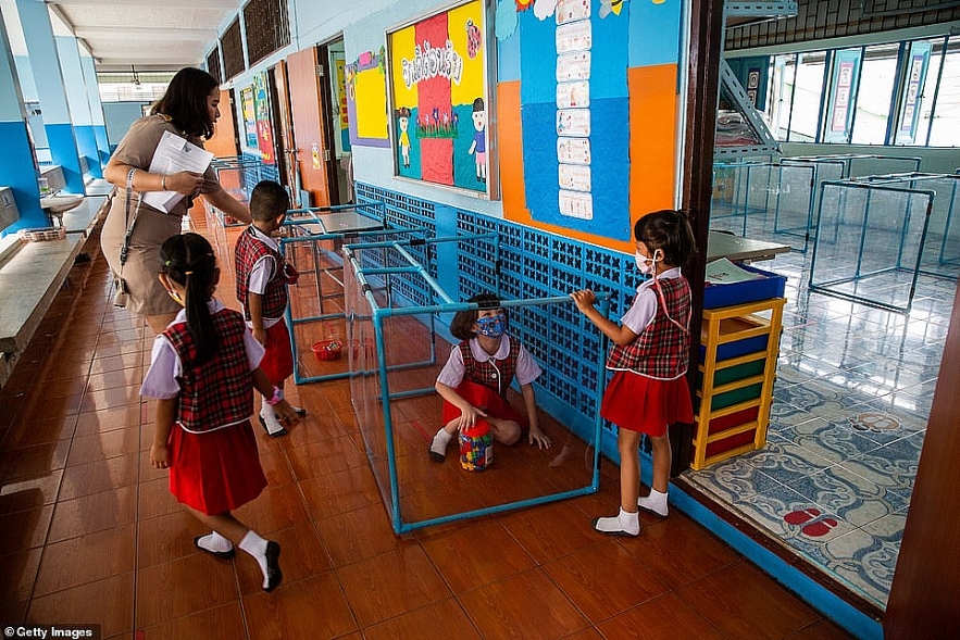 images show nursery children keep the worlds strictest school social distancing in thailand