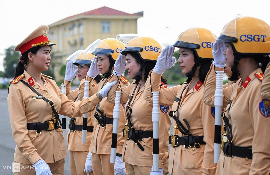 Vietnamese traffic police women exercise to lead groups of delegation by powerful motorcycles.