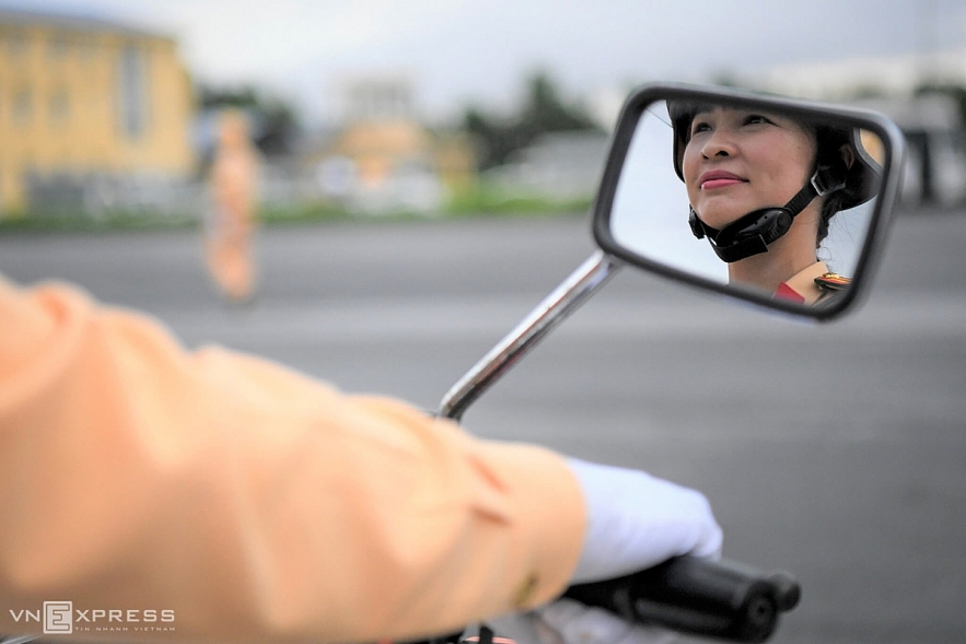 Vietnamese traffic police women exercise to lead groups of delegation by powerful motorcycles.