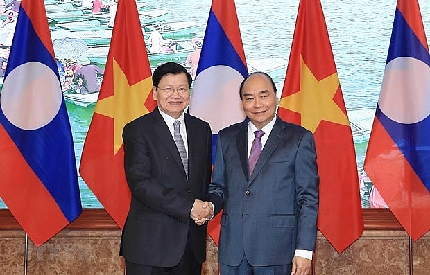 Vietnamese and Lao Governments determined to foster comprehensive cooperation