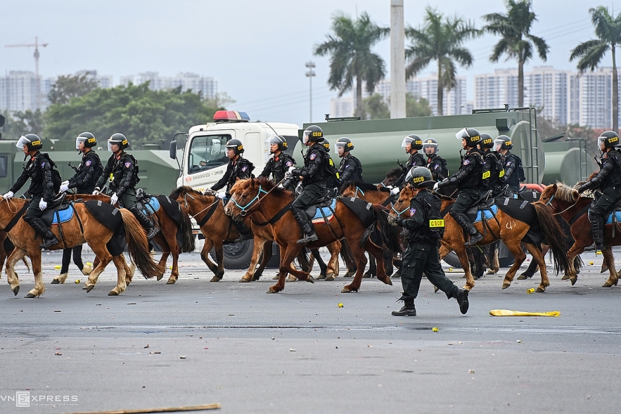 Vietnam's cavalry mobile police force first rehearses against protesters