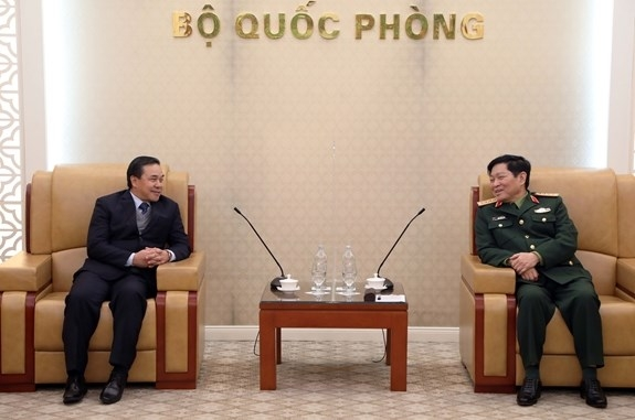 minister of national defence meets and discusses with lao ambassador to promote ties
