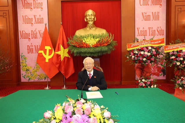 Vietnam and Laos' Top leaders hold phone talks