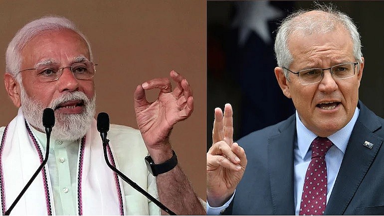 PM Narendra Modi (L) and his Australian counterpart Scott Morrison