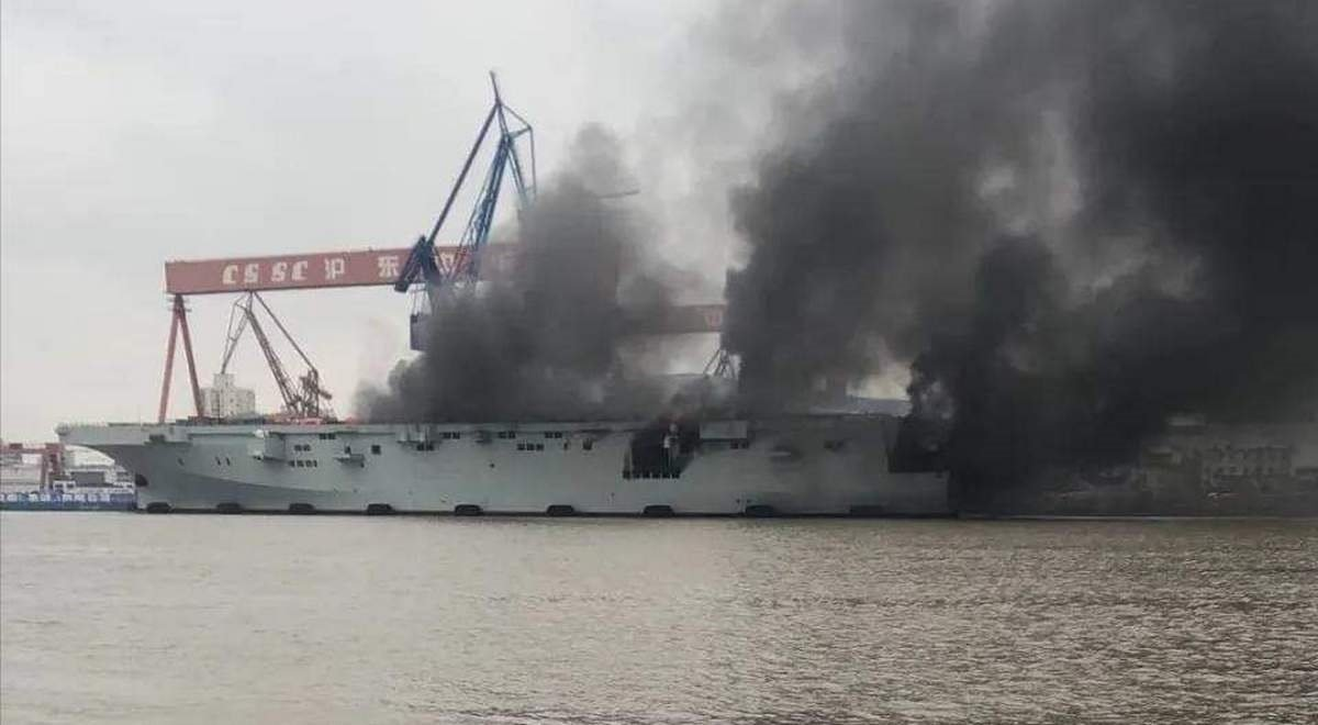 a new chinese amphibious assault ship caught fire