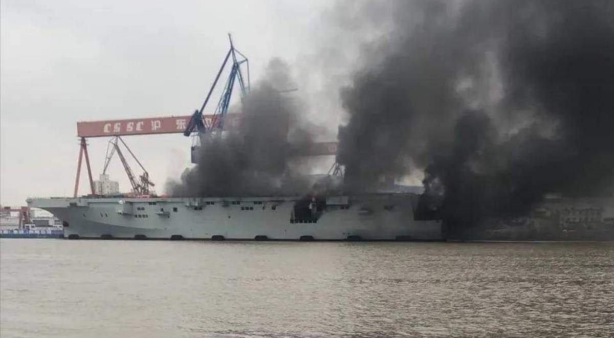 A new Chinese amphibious assault ship caught fire