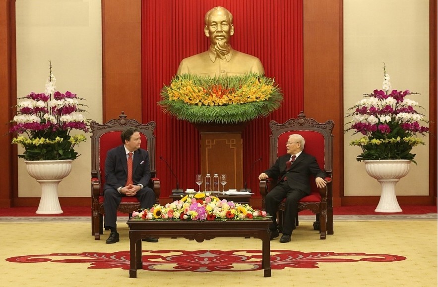 Party General Secretary Nguyen Phu Trong (R) hosts US Ambassador Marc E. Knapper
