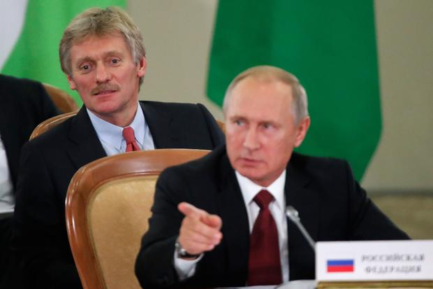 vladimir putins spokesman dmitry peskov hospitalized with a covid 19 infection