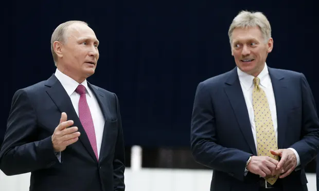 vladimir putins spokesman dmitry peskov hospitalized with a covid 19 infection