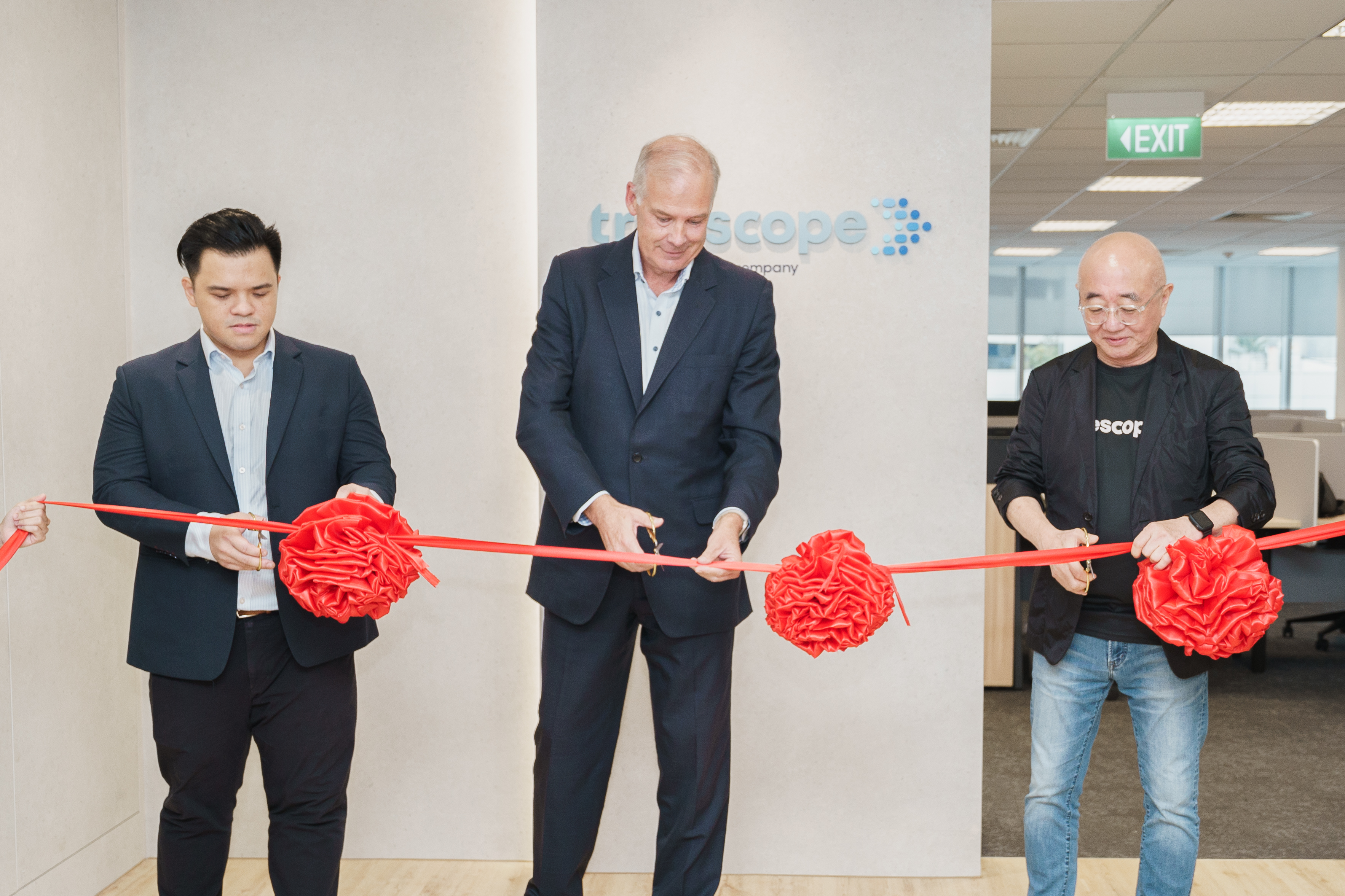 Ribbon-cutting ceremony during the grand opening of Truescope Singapore's new office along Scotts Road. (L-R Jason Lee, CEO of Truescope Singapore, John Croll, Co-Founder and CEO of Truescope and David Liu, Co-Founder and CEO of Dataxet)