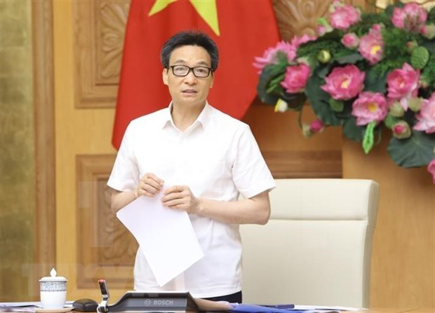 deputy pm vu duc dam chairs meeting to help tourism sector overcome covid 19 pandemic