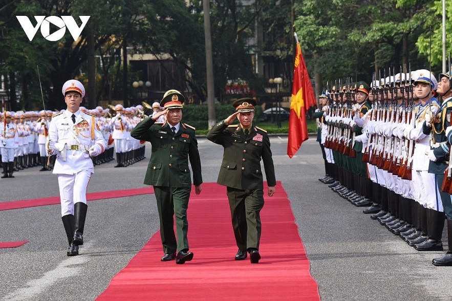 Sen. Lieu. Gen. Nguyen Tan Cuong, Chief of the General Staff of the Vietnam People’s Army and Deputy Minister of Defense and his Lao counterpart Khamliang Outhakaysone review the guard of honour in Hanoi on June 2.