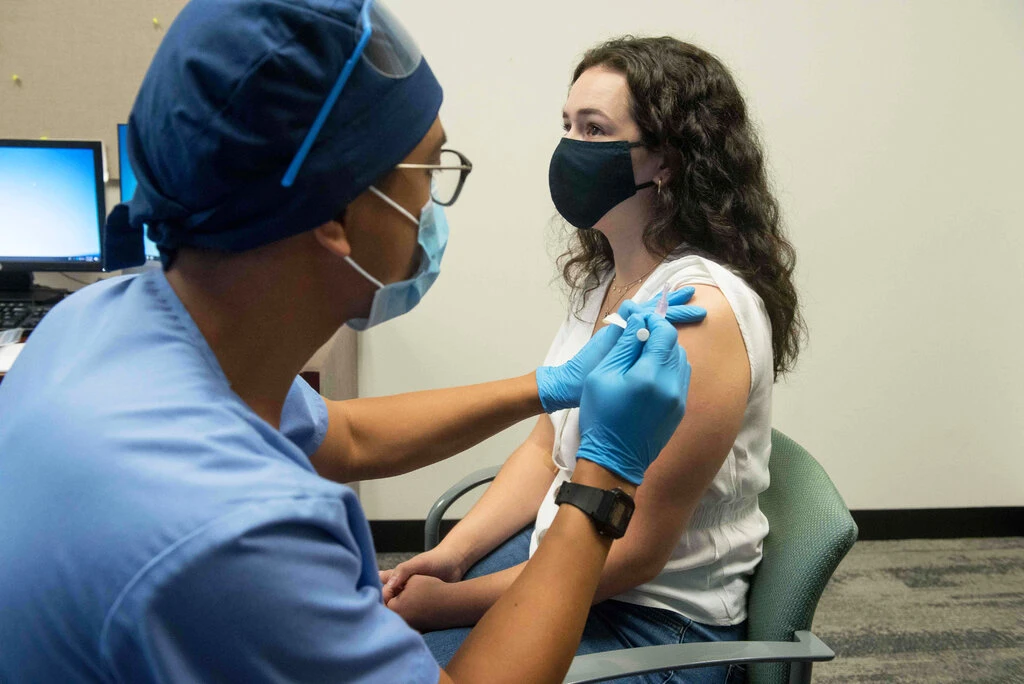 A volunteer received an injection of Moderna’s vaccine candidate earlier this year.Credit...Henry Ford Health System, via Agence France-Presse — Getty Images