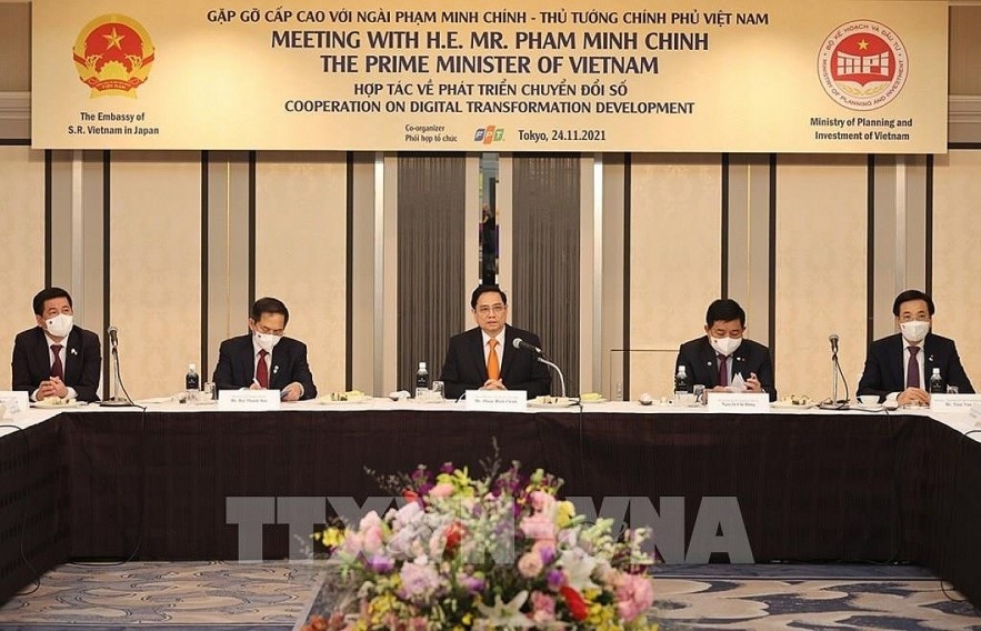 Prime Minister Pham Minh Chinh holds a working session with leaders of major digital transformation groups of Japan (Photo:VNA)
