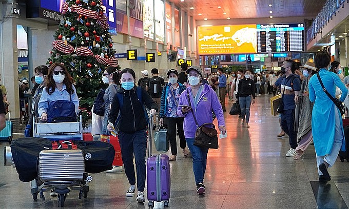 Passengers at Tan Son Nhat International Airport in HCMC on January 23, 2022. Photo: VnExpress