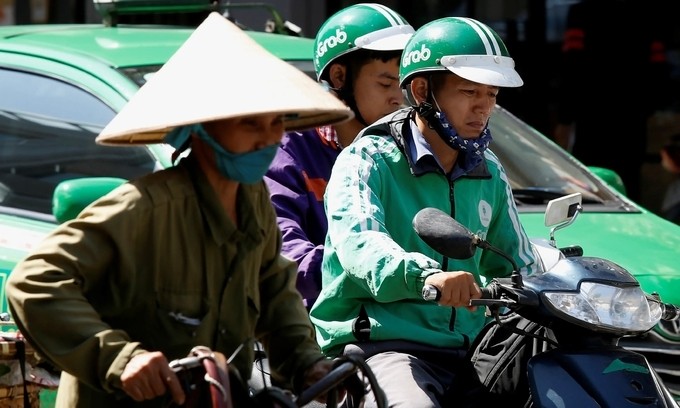 vietnam news today feb 10 hanoi resumes motorbike ride hailing services