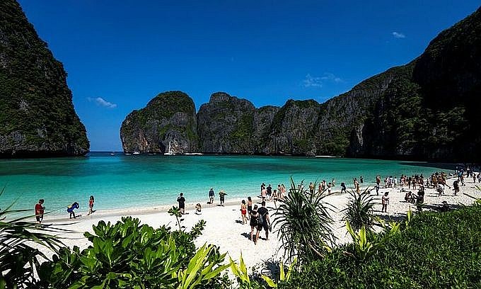 Tourists visit Maya bay after Thailand reopened its world-famous beach after closing it for more than three years to allow its ecosystem to recover from the impact of overtourism, at Krabi province, Thailand, January 3, 2022. Photo: Reuter
