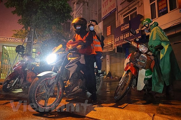 First-Aid 'Angels' Protect Vietnamese Motorists