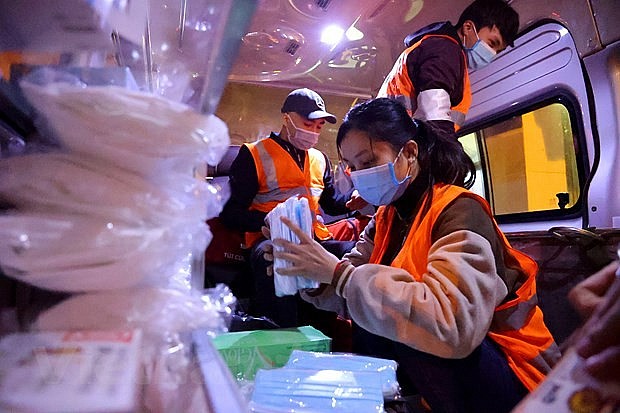 First-Aid 'Angels' Protect Vietnamese Motorists