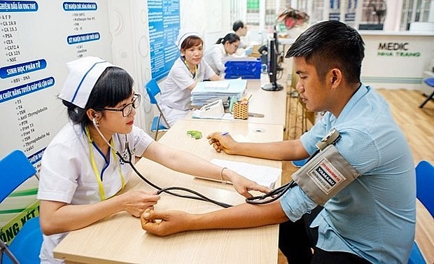 Vietnam works hard to reach universal health coverage by 2030. Photo: hanoimoi.com.vn