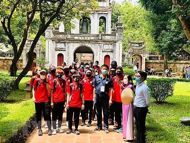 Thai athletes competing at SEA Games 31 tour the Temple of Literature in Hanoi. Photo: VNA