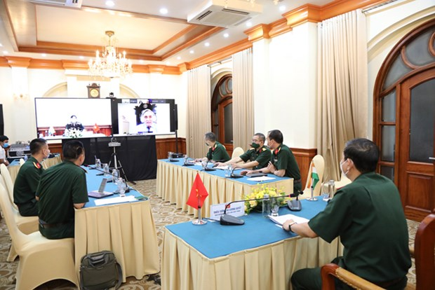 Director of the Institute for Defence Strategy Maj. Gen. Vu Cuong Quyet chairs the webinar from Hanoi. Photo: mod.gov.vn