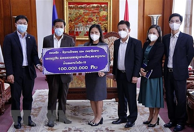 Overseas Vietnamese in Japan, Laos support Covid-19 vaccine fund